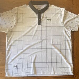 Lacoste Men's Polo Shirt with Black and White Grid Pattern